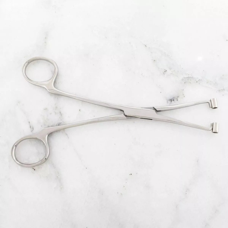 6″ Long High Grade 410 Surgical Steel Septum Forceps. Tubes Are Big Enough to Allow a 10g Needle to Pass Through Ease.  – 1 Piece