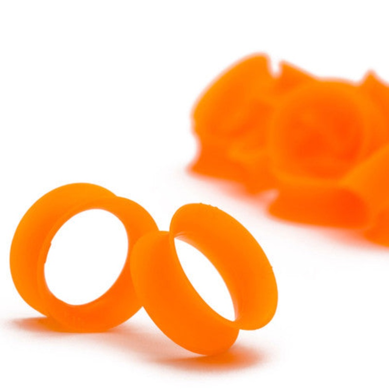 UV Orange Skin Eyelets by Kaos Softwear 6 gauge (4.1mm) UV Orange